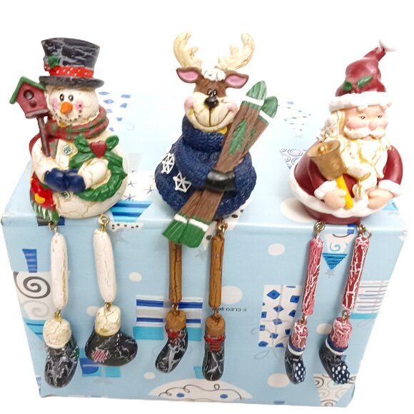 Holiday Shelf Sitting Figurine: Hanging Snowman, Moose & Santa - Picture 1 of 7